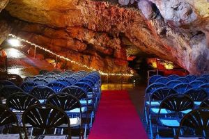 Chair theatre style set up in a Cave at Kents Cavern, Torquay